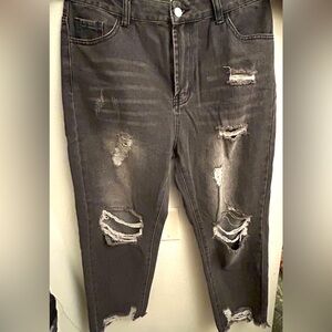 Shein black ripped jeans with rips at the knees. (Swipe for more pictures).